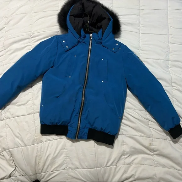 Children’s XL moose knuckle bomber jacket in blue.